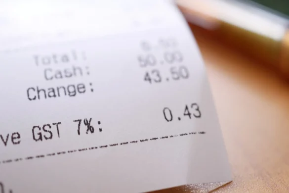 Receipt showing totals: cash paid 50.00, change 43.50, GST 7% (0.43) and total amount on the left side